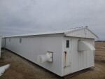 added another fan.. set up with misters and cool cell pump and controls. Added a side door.  It has not been used in the last 2 years. 
We did collect in this barn so there is a collection pen and dummy
