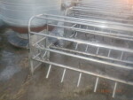 picture 4  of 5 - 24 Stainless steel crates - $300 each. they have not been around hogs for at least 15 years.  They had been feeding bottle calves as that is what the black holder is.